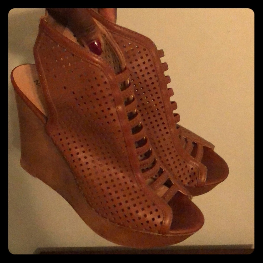Dark brown sandals.